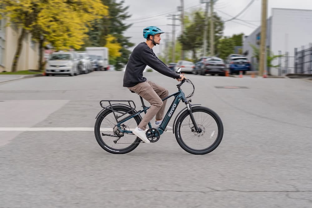 man test riding e bike city