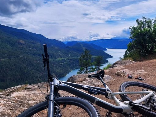 mountain bike overlooking west kelowna trail.